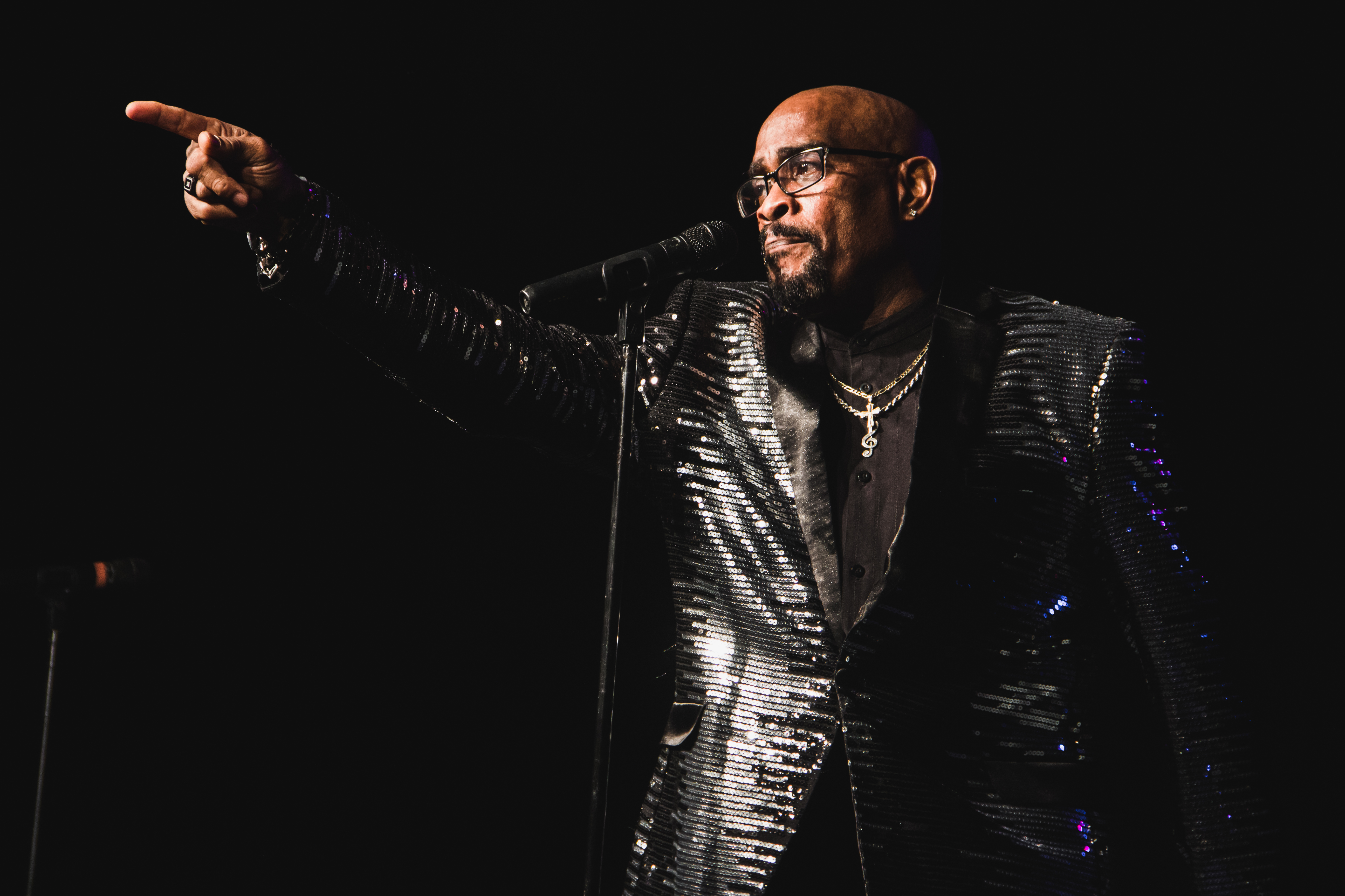Photo of man in sparkling black tuxedo.