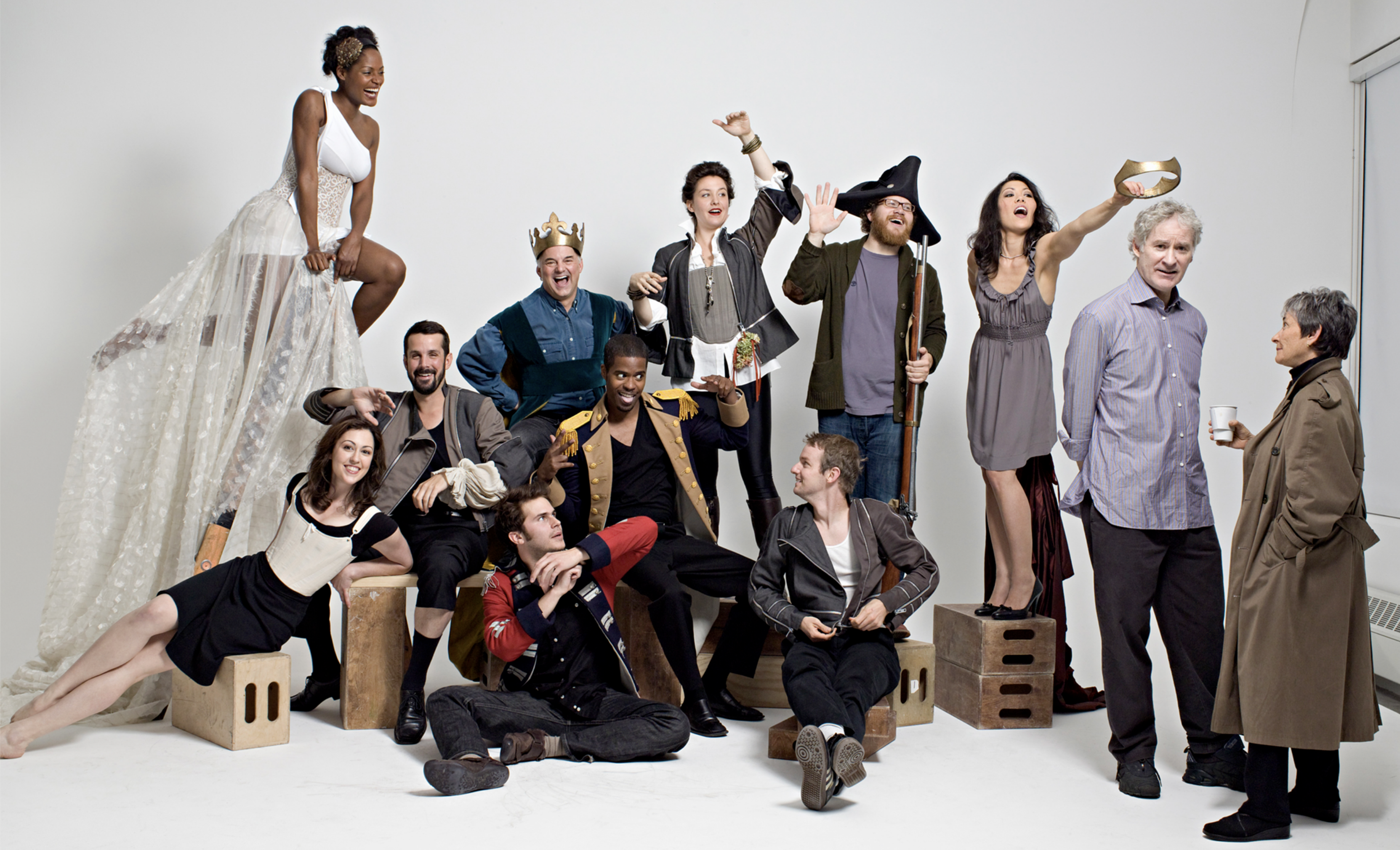 Photo of The Acting Company cast in various kitschy costumes.